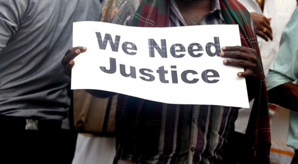 Sign held by a Tamil protester in Jaffna on February 24, 2015. Image source: http://tamilguardian.com/article.asp?articleid=13897